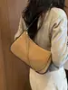 Bolso de hombro de diseño de nicho nuevo, bolso cruzado de alta calidad, bolso de hombro versátil y elegante, bolso de axila moderno para el día a día