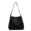 Bolso tote de gran capacidad para mujer, nuevo modelo 2025, bolso de hombro de cuero genuino, simple y versátil para ir al trabajo, bolso tipo cubo de cuero suave
