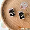 Protector de cable de carga con diseño de gato negro 2D, diseñado para prevenir roturas y mordeduras, compatible con conectores Tipo-C/Lightning