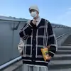 Suéter cárdigan de estilo perezoso holgado de moda para primavera y otoño, nueva chaqueta de punto a cuadros versátil y elegante para hombre