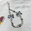 Lanyard para Teléfono de Perlas con Lazo Plateado Dulce y Fresco Cadena de Teléfono con Cuentas Femenina Adorno Colgante para Cámara CCD Encanto de Bolsa