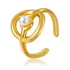 Anillo Geométrico Hueco de Acero Inoxidable Transfronterizo Europeo y Americano para Mujer Moda Europea y Americana Anillo de Trébol de Cuatro Hojas de Acero de Titanio Dorado de 18K Venta al por Mayor