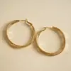 Pendientes Redondos Retorcidos de Tres Capas Estilo Metalero Europeo y Americano Pendientes Geométricos de Moda Simple Transfronterizos Pendientes de Alta Gama para Mujer