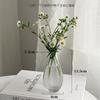 En stock de fábrica Mini Jarrón Vidrio con Relieve Francés Transparente Hidropónico Adornos para Arreglos Florales Botella Fragante Botella Vacía Decorativa