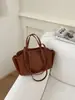 Bolso de mano retro de moda transfronterizo para mujer, nuevo y elegante bolso tote tipo cubo, bolso de hombro y cruzado de nicho