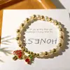 Pulseras de Cuentas Transfronterizas Europeas y Americanas Más Vendidas, Fruta, Cereza, Fresa, Amor, Insecto, Pulseras de Perla Chapadas en Oro, Accesorios para la Mano