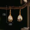 Novo estilo chinês estilo chinês Hanfu palácio estilo chinês brincos 2024 moda chinesa estilo retro imitação hetian jade borla brincos para mulheres
