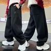 Pantalones de Chándal Sueltos Estilo Coreano para Niños Estilo Primavera y Otoño para Niños Medianos y Mayores Moda Casual Pantalones Tendencia Genial Deportivos Largos Color Sólido Estilo Versátil