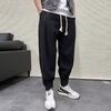 Pantalones deportivos tipo harén para hombre, de estilo casual americano, con volantes, ajustados, holgados y con cordones en los tobillos, de marca de moda, con diseño drapeado