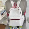Nuevo modelo 2026 mochila casual estampada estilo ins para estudiantes de secundaria y primaria, mochila ligera de gran capacidad para ir a la escuela para niñas