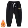 Otoño e invierno 2023 terciopelo de zorro plateado acolchado cálido pantalones para niño Chad Arcilla Salvaje pantalones largos para niños
