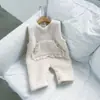 INS invierno forro polar estilo western para bebé suave grueso encaje de lana de cordero bolsillo grande sin mangas mameluco