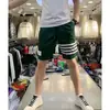 Pantalones cortos de chico espíritu Pantalones de red de moda para hombre elásticos ajustados de tres puntos pantalones deportivos de cinco puntos pantalones cortos de playa ropa exterior