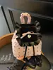 Mochila de Encaje Coreano a Cuadros Transfronteriza 2025 Nueva Nicho Esponjosa con Volantes Mini Mochila de Cuadros de Cereza