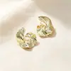 Pendientes de Venta Caliente Transfronterizos en Varios Estilos de Europa y América, Pendientes de Diseño Exagerado de Gama Alta de Círculo Metálico con Forma de Flor en Stock