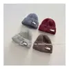 2026 Nuevo Suéter de Punto para Otoño/Invierno Gorro de Moda Cálido que Protege los Oídos Gorro de Lana con Lazo de Punto