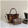 Bolsa Retrô Grande Capacidade Feminina 2026 Novo Estilo Moda Camurça Pelúcia Bolsa Tote Toque de Luxo Para o Trabalho Deslocamento Bolsa de Ombro Única
