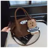 Bolso Pequeño Retro Escarchado Transfronterizo para Mujer Otoño e Invierno 2025 Nueva Moda Nicho Bolso Cruzado de Mano Plegado Tipo Cubo