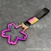 Correa de mano con asa de color JDM para coche, serpentina universal, cinturón de remolque para parachoques delantero y trasero de coche, anillo de advertencia