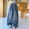 Ropa de Otoño para Niñas Jeans 2026 Nuevo Estilo Pantalones Casuales Holgados para Niños Medianos y Grandes Pierna Doble Pliegue Pierna Torcida a la Moda Venta al por Mayor