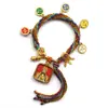Pulseira do deus da riqueza de cinco vias estilo Xizang oito santos padroeiros cinco mestres Manjushri deus da riqueza amarelo thangka corda tecida à mão pulseira do ano desta vida