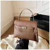 Bolsa Pequena Retrô de Textura Premium para Mulheres 2025 Nova Moda Versátil Bolsa Transversal Exquisite Super Popular Bolsa Carteiro Pequena Quadrada