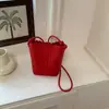 Bolsa de palha trançada simples de alta qualidade, design de nicho transfronteiriço para mulheres, novo modelo 2026, bolsa de ombro e transversal