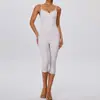 Nuevo conjunto de yoga transfronterizo para mujer, adecuado para uso casual al aire libre, con un hermoso diseño en la espalda, para deportes, fitness, levantamiento de glúteos y running ajustado, conjunto de dos piezas