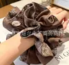 En stock al por mayor estilo universitario scrunchie para moño pequeño de encaje para la cintura scrunchie cuerda para el pelo scrunchie