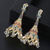 Aretes Jinse Export Medio Oriente Set de Cobre Aretes de Cristal de Zirconia Creativo India Borla de Pluma de Pavo Real Viento Joyería para la Oreja