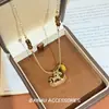 ¡Año del Zodiaco! Collar Retro Maillard Ojo de Tigre Pony para Mujer Moda Elegante Cadena de Suéter Otoño e Invierno Accesorios Largos