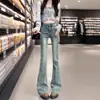 Jeans acampanados azules de tiro alto estilo retro americano para mujer, colección de primavera, corte ajustado, largos hasta el suelo, con dobladillo deshilachado y diseño de pierna ancha