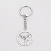 Llavero de cadena de cinta de acero de titanio con corte de estilo europeo y americano, anillo llavero con colgante de colibrí hueco, llavero de acero inoxidable 304
