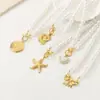 Pulsera de Acero de Titanio con Colgante de Corazón con Perlas, Cadena de Perlas Retro Francesa de Alta Gama, Hebilla Ot de Lazo, Estrella de Mar Festoneada, Diamante