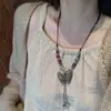 Collar Colgante de Campana de Cerámica Mariposa Estilo Étnico Vintage para Mujer, Nuevo Accesorio de Cadena Larga para Suéter de Moda 2025
