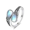 Anillo de Piedra Lunar con Patrón de Flor de Margarita de Venta Caliente Transfronterizo Anillo Abierto Simple Moda Europea y Americana Bohemio Retro