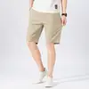 Shorts Casuais de Cor Sólida em Algodão Lavado 2026 Novo Verão Estilo Hong Kong Shorts Casuais Roupa de Trabalho Masculina Shorts de Praia