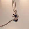 Colar de Corrente com Pérolas para Suéter Feminino Versátil Outono e Inverno Simples e Elegante High-End Pequeno Perfume Retrô Pingente de Flor Atacado