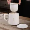 Taza de porcelana blanca separación de té taza de jade de sebo taza de oficina taza de cerámica para té de gran capacidad al por mayor