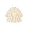 Vestido Nuevo para Niñas Primavera/Otoño 2026 Color Crema Cuello de Encaje Francés Mangas Abullonadas Longitud Media Vestido de Princesa Vestido Infantil