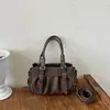 Bolsos de mujer de nicho 2026 nueva moda bolso tote plisado bolso de hombro con un toque elegante de alta gama bolso cruzado
