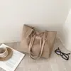 2026 Color Sólido Moda Nueva Tendencia Simple Popular Bolso Tote de Gran Capacidad para Mujer Textura Colgante Casual Bolso para el Trabajo
