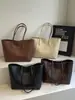 Bolso tote de gran capacidad estilo coreano, nuevo modelo principios de otoño 2026, bolso de hombro casual simple para el trabajo y los desplazamientos