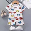 2025 Nova Camiseta de Manga Curta Infantil Verão Bebês Meninos e Meninas Conjunto de Shorts de Manga Curta para Bebê Venda por Atacado para Casa