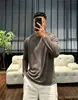 Novo modelo do fabricante original: Camiseta masculina de manga longa feita de Lyocell Tencel, com um design de malha de cor sólida, gola redonda, fresco e respirável