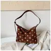 Bolso de mujer de gran capacidad 2026 nuevo bolso de moda casual para principios de otoño para la escuela y el trabajo, bolso tipo albóndiga de hombro y cruzado