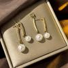 Aretes de perlas moda temperamento elegantes aretes estilo socialité aguja de plata diseño nicho lujo ligero aretes de alta gama al por mayor