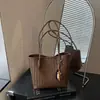 Bolso de hombro transfronterizo para mujer, bolso de axila tejido simple vintage, nuevo bolso tote versátil para el día a día y para ir al trabajo 2026