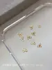 Accesorios de aleación para arte de uñas personalizados, mini moños, decoraciones de uñas de macarrón 3D de moda, venta al por mayor en grandes cantidades