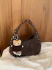 Bolsas para mujer, bolsas para mujer de comercio exterior, bolsos vintage marrones de hombro y axila, bolsos de remaches de alta gama, transfronterizo